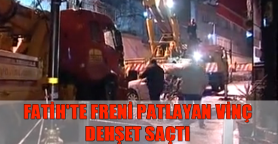 Fatih'te freni patlayan vinç bir otelin önünde bekleyen aracı ezip, otele çarparak durabildi.