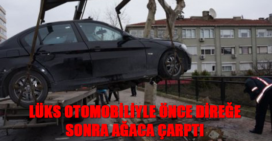 Lüks otomobiliyle önce direğe, sonra ağaca çarptı